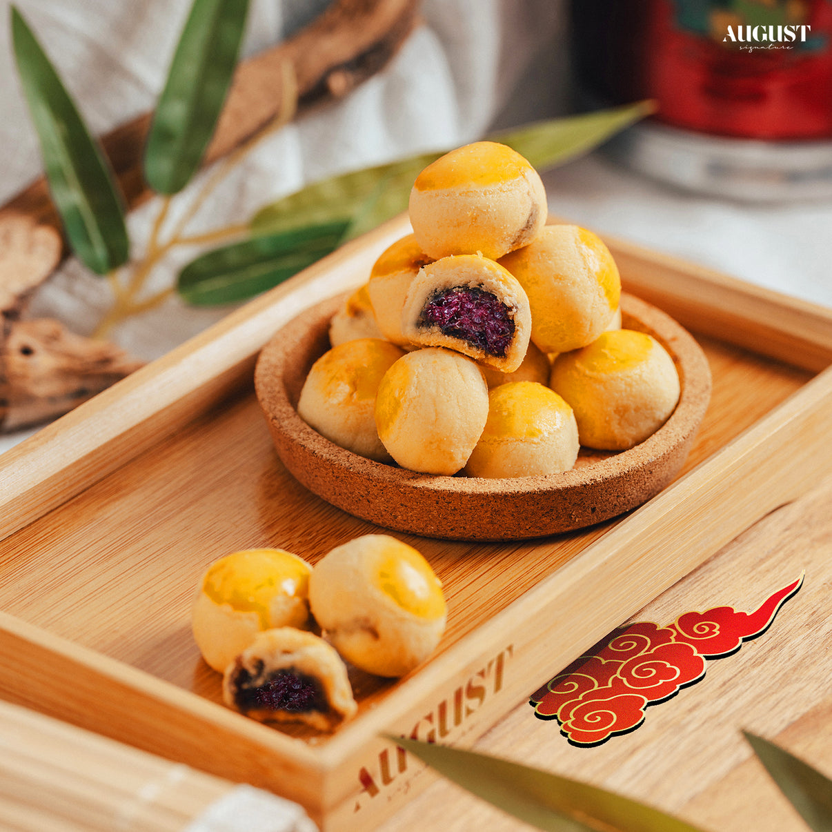 Best CNY goodies - Blueberry cheesecake tarts and pineapple ball cookies, perfect for Chinese New Year celebrations and gifting in Singapore.