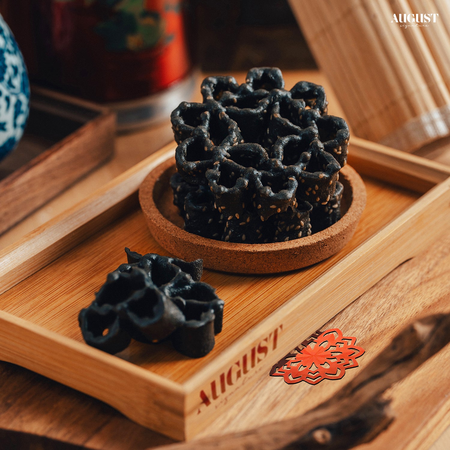 Best CNY goodies 2025 - Honeycomb sesame charcoal cookies, a unique and crispy festive treat for Chinese New Year celebrations in Singapore.