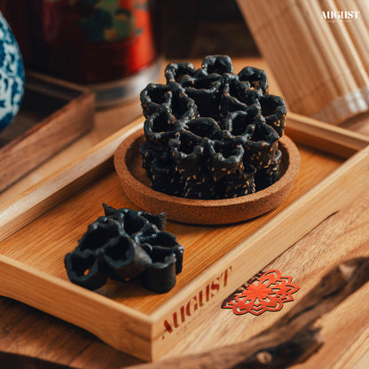 Best CNY goodies 2025 - Honeycomb sesame charcoal cookies, a unique and crispy festive treat for Chinese New Year celebrations in Singapore.